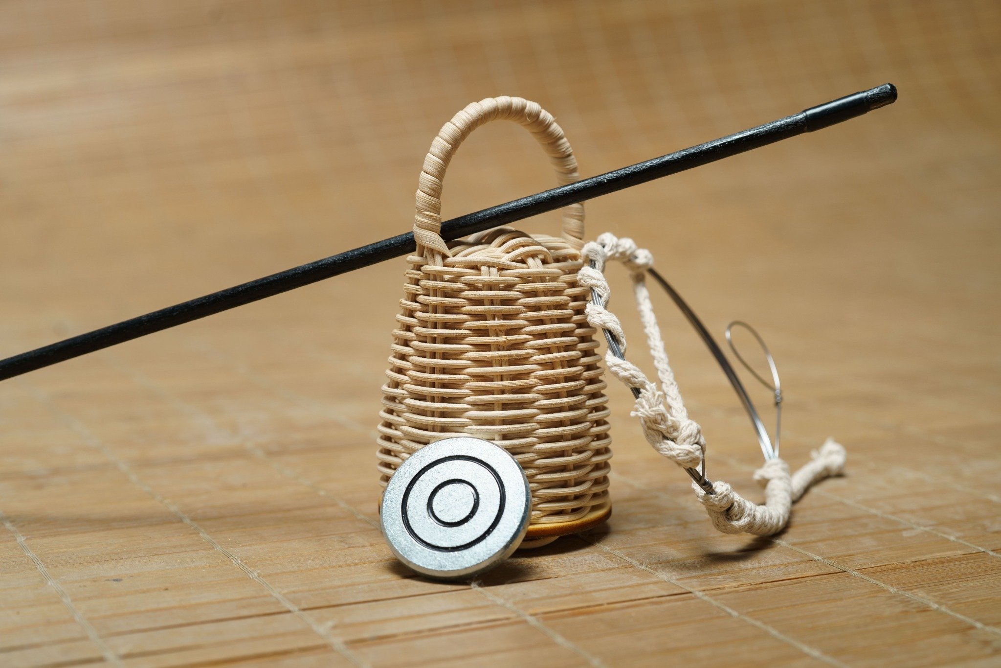 Circular dobrao coins with engraved patterns, traditional tools for capoeira berimbau players.